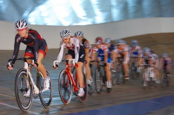 World pursuit champion Sarah Hammer on the front.