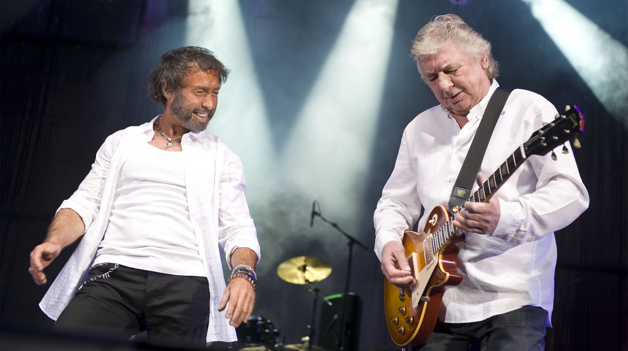 BIRMINGHAM, UNITED KINGDOM - APRIL 01: Mick Ralphs and Paul Rodgers (R) of Bad Company perform on stage at LG Arena on April 1, 2010 in Birmingham, England.