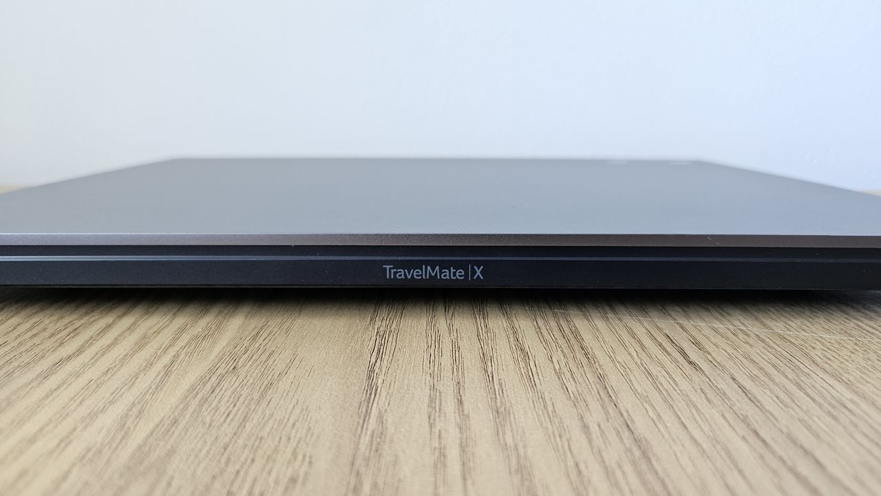 The Acer TravelMate X14 AI on a desk