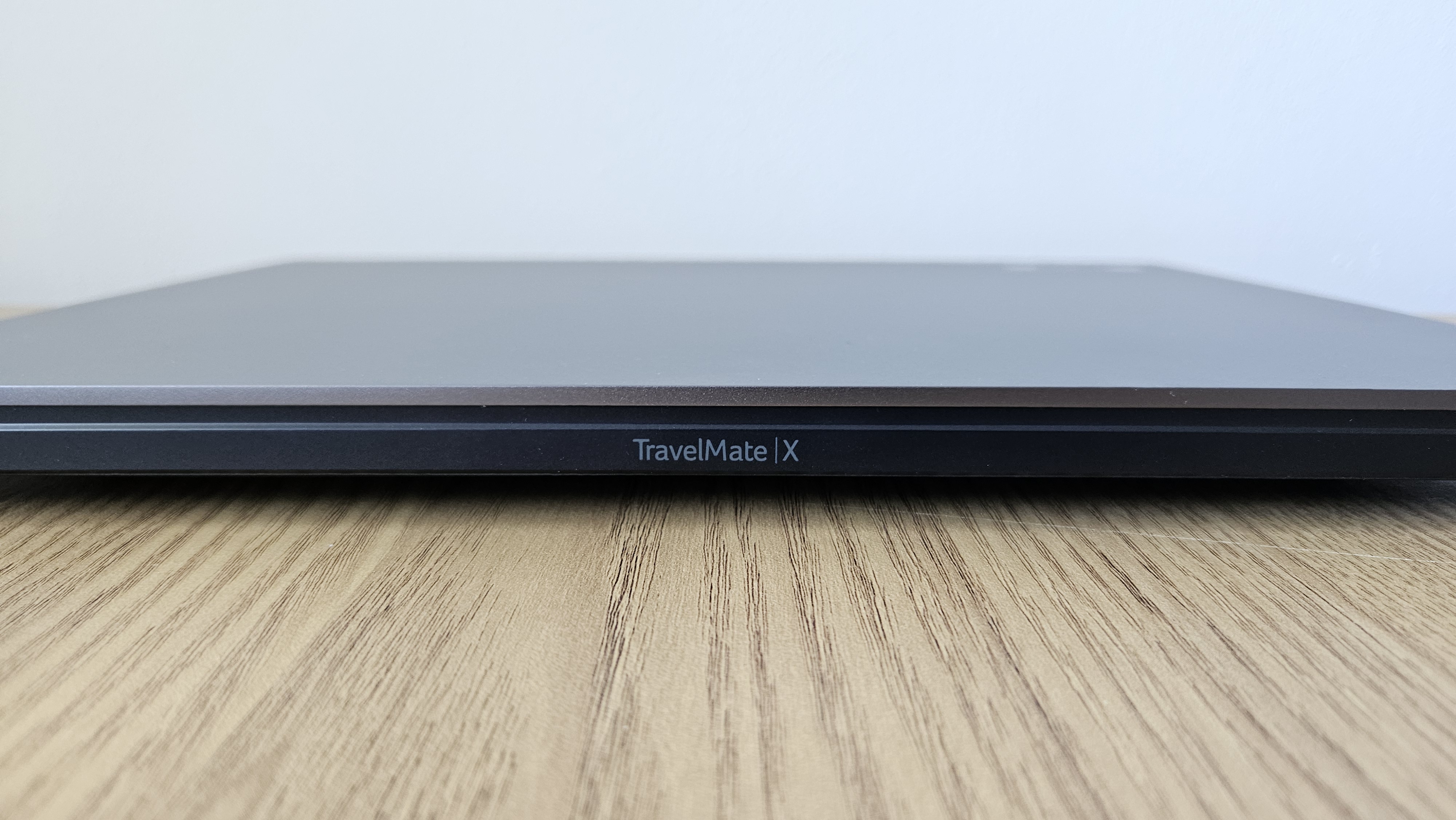 The Acer TravelMate X14 AI on a desk