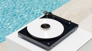 Pro-Ject Debut Pro B turntable on a white plinth