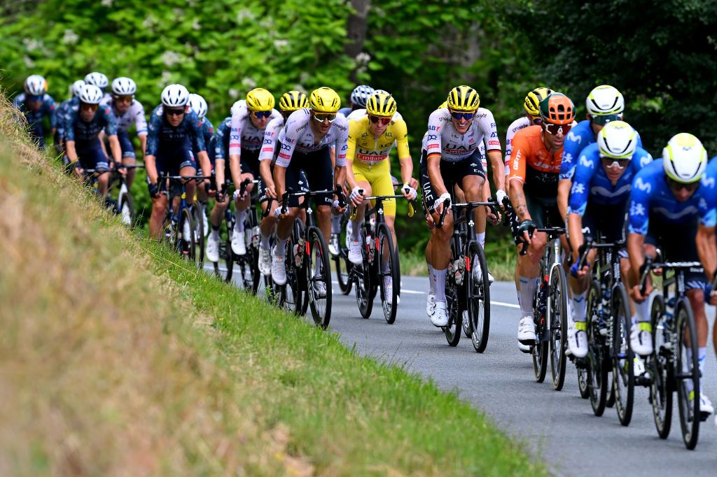 VILLENEUVESURLOT FRANCE JULY 11 LR Marc Soler of Spain Tadej Pogacar of Slovenia Yellow Leader Jersey and Nils Politt of Germany and UAE Team Emirates compete during the 111th Tour de France 2024 Stage 12 a 2036km stage from Aurillac to VilleneuvesurLot UCIWT on July 11 2024 in VilleneuvesurLot France Photo by Dario BelingheriGetty Images