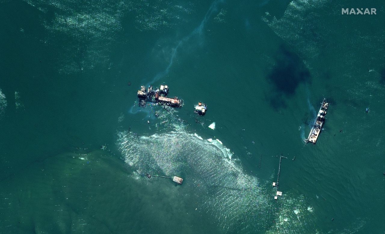 Clean Gulf Associates, a nonprofit oil spill response cooperative, placed a containment boom in the area to reduce the spread of the oil.