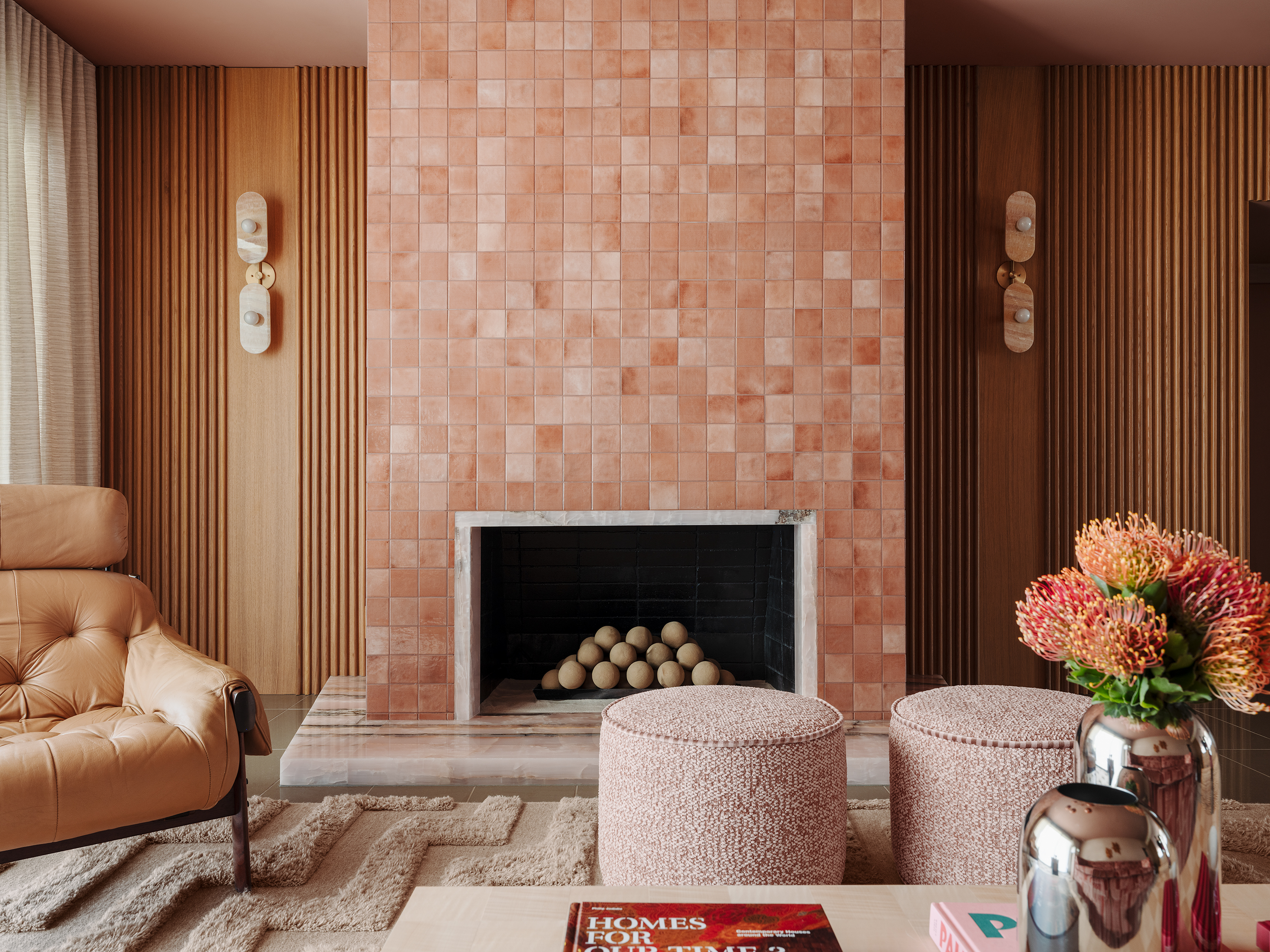 Licing room with tiled fireplace