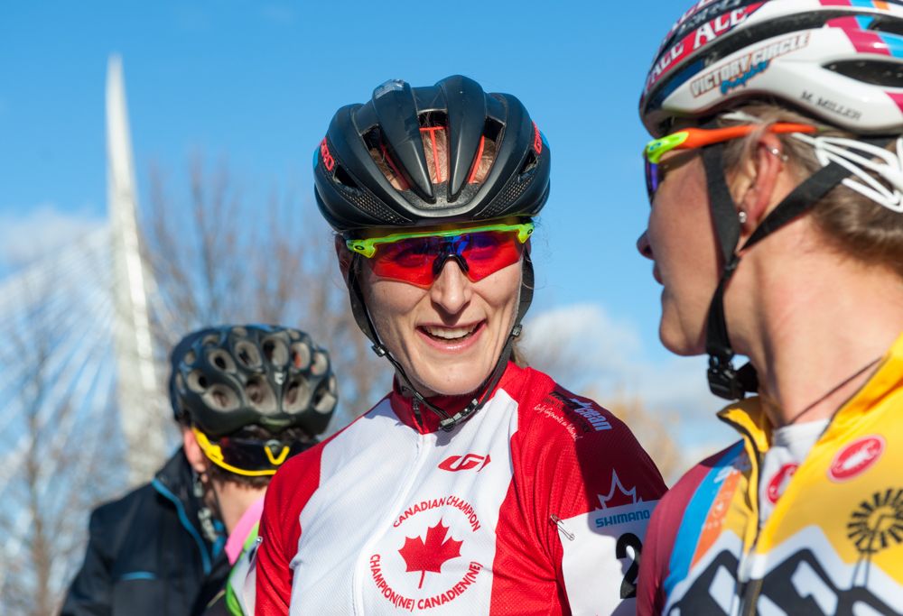 Mical Dyck checks in with Meredith Miller after the finish