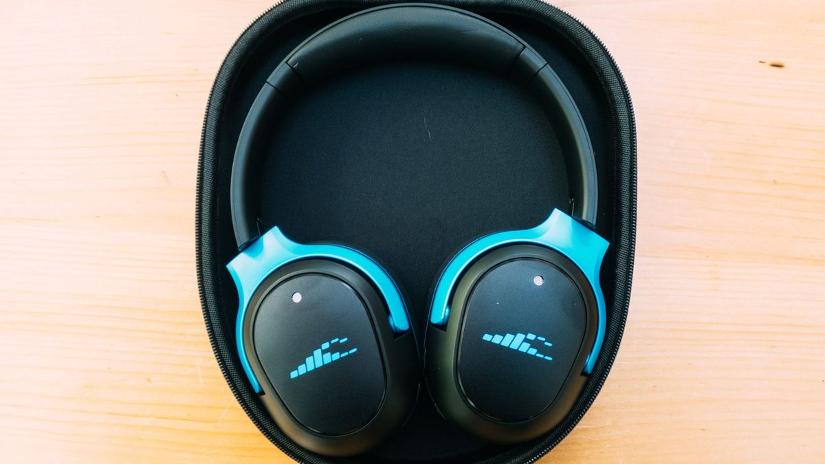 A pair of H2O Ript Ultra headphones in their case