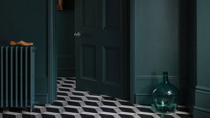 dark hallway with patterned geometric tiles