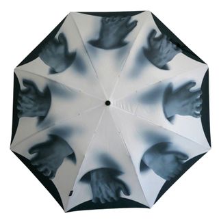 This optical illusion umbrella is sure to make people double take