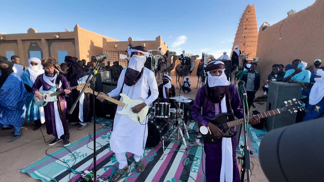 Camels, swords and dance: The film of Mdou Moctar's concert at the edge of the Sahara desert is a thing of joy and magic