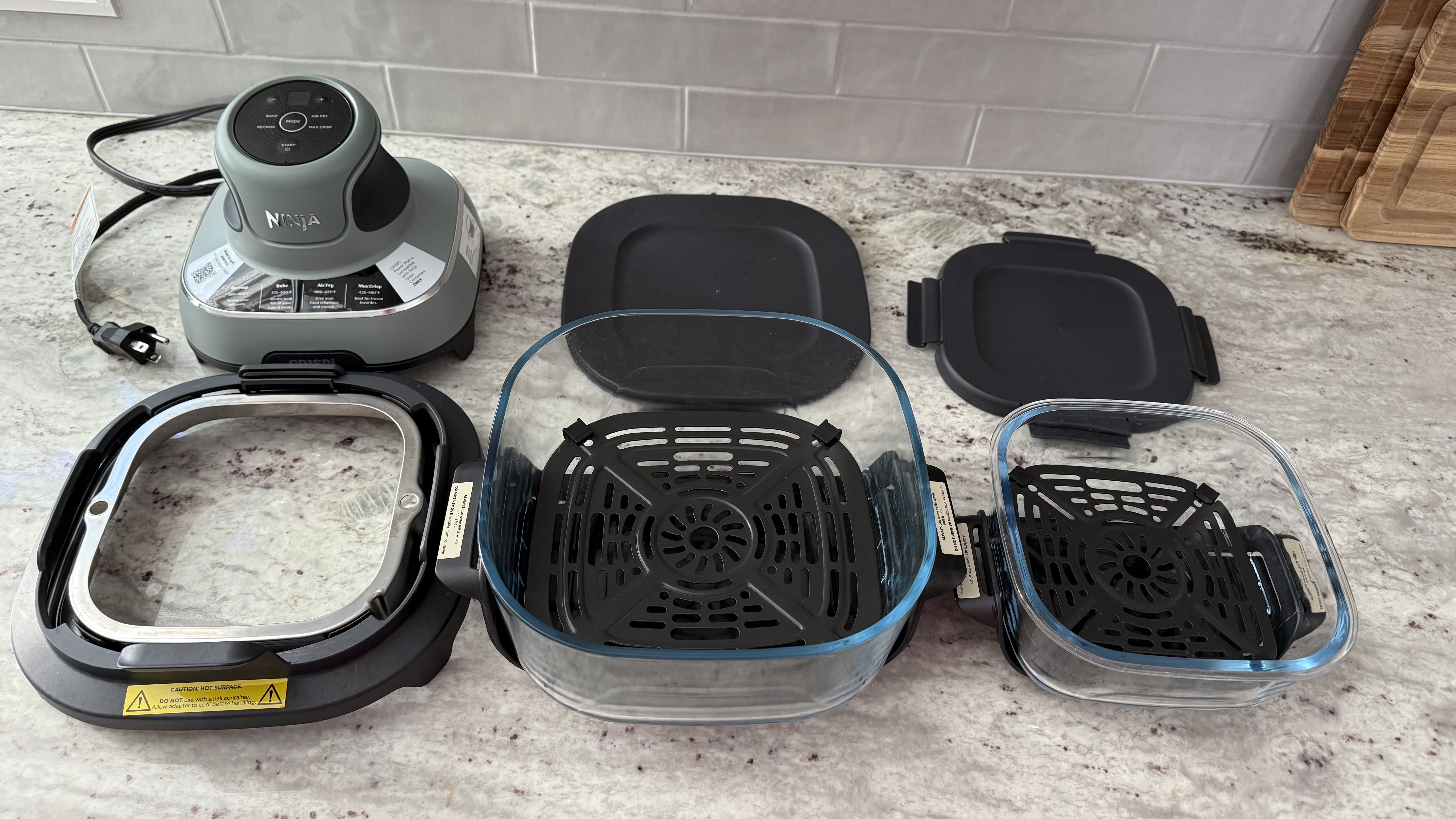 Ninja Crispi Portable Glass Air Fryer Cooking System on counter