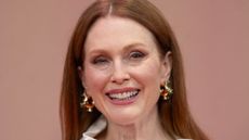 julianne moore on a pink background