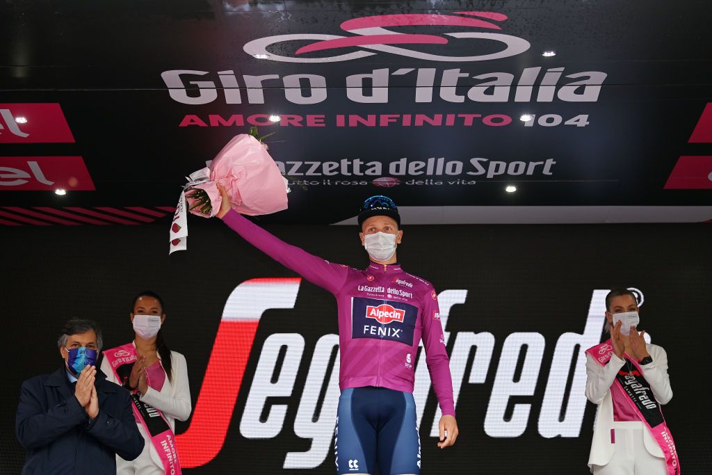 CANALE ITALY MAY 10 Tim Merlier of Belgium and Team AlpecinFenix Purple Points Jersey celebrates at podium during the 104th Giro dItalia 2021 Stage 3 a 190km stage from Biella to Canale girodiitalia Giro on May 10 2021 in Canale Italy Photo by Stuart FranklinGetty Images