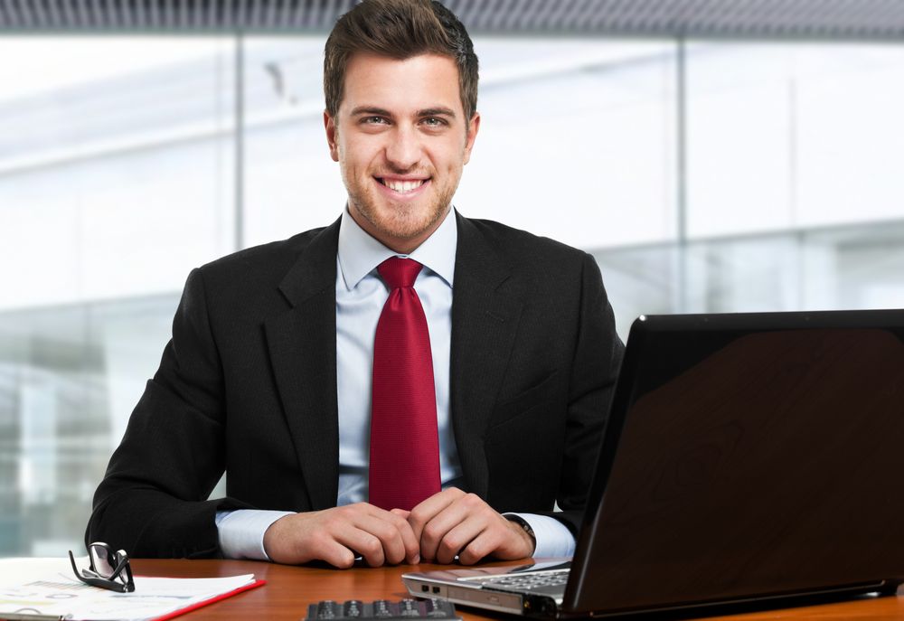 Man sitting at desk. 