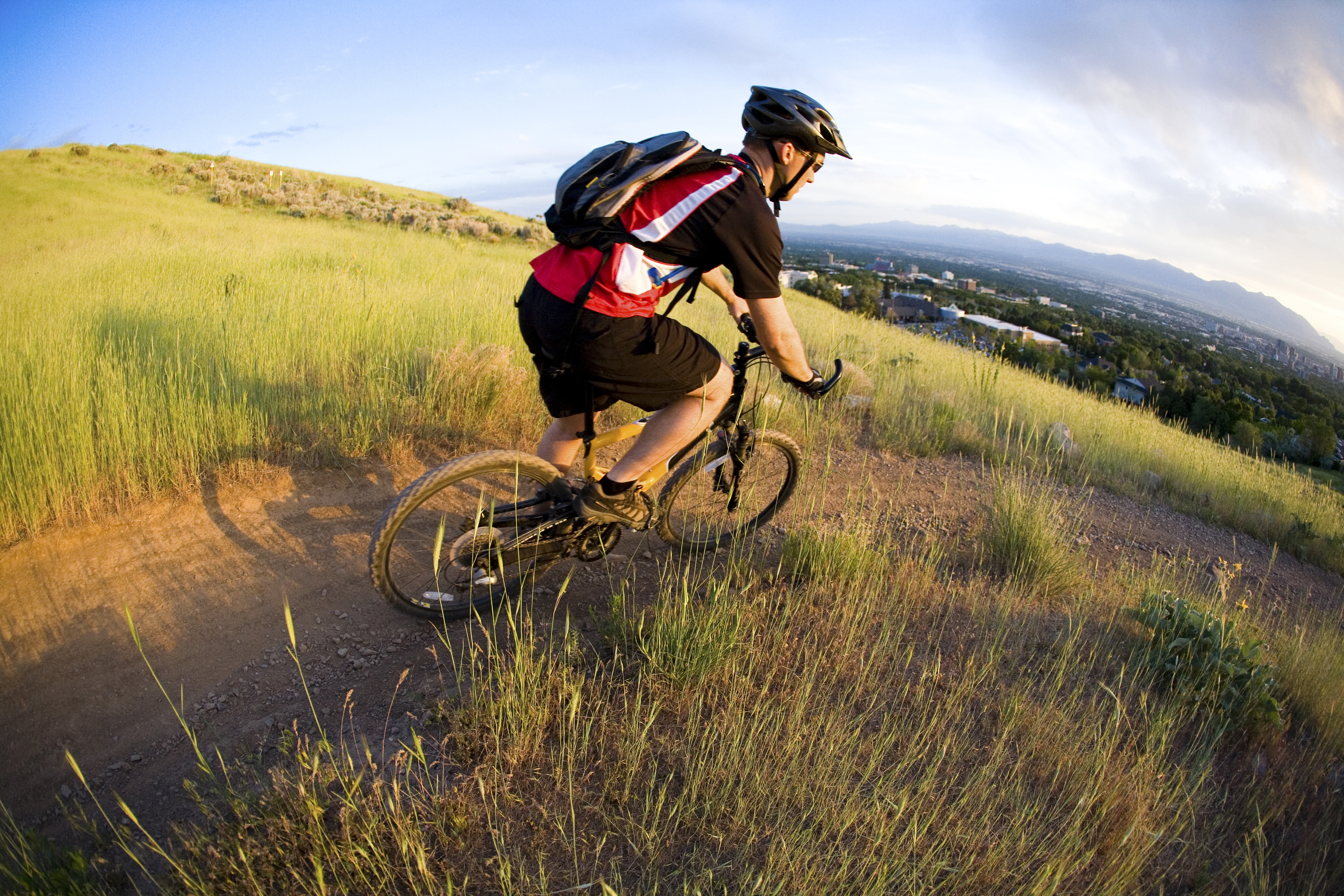 A man on a mountain bike rides down the Bonneville Shoreline Trail in Salt Lake City