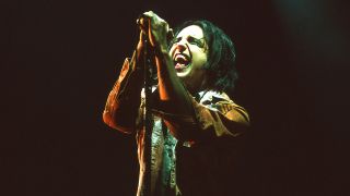 Trent Reznor screaming on stage