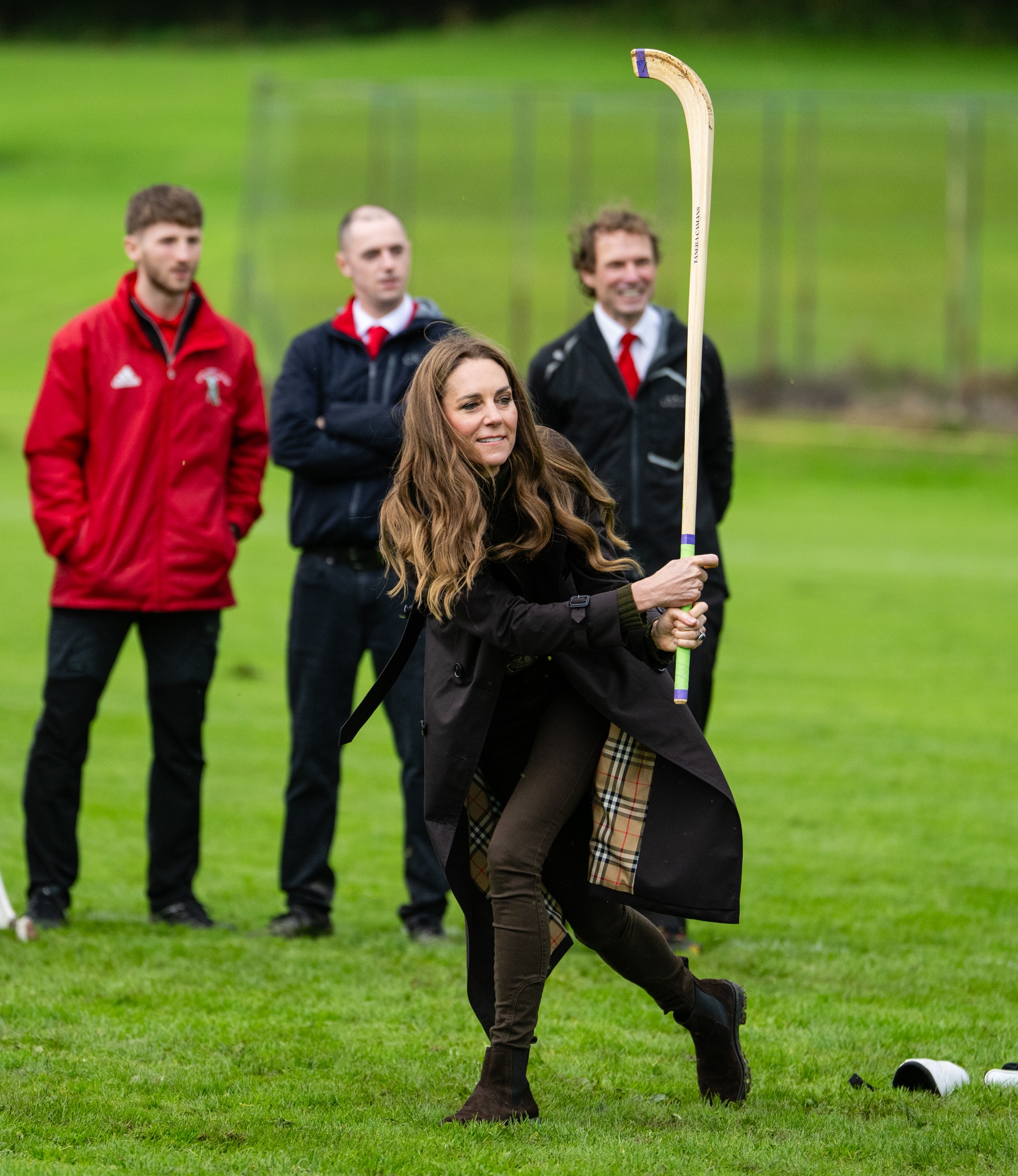 Princess Kate swinging a shinty stick