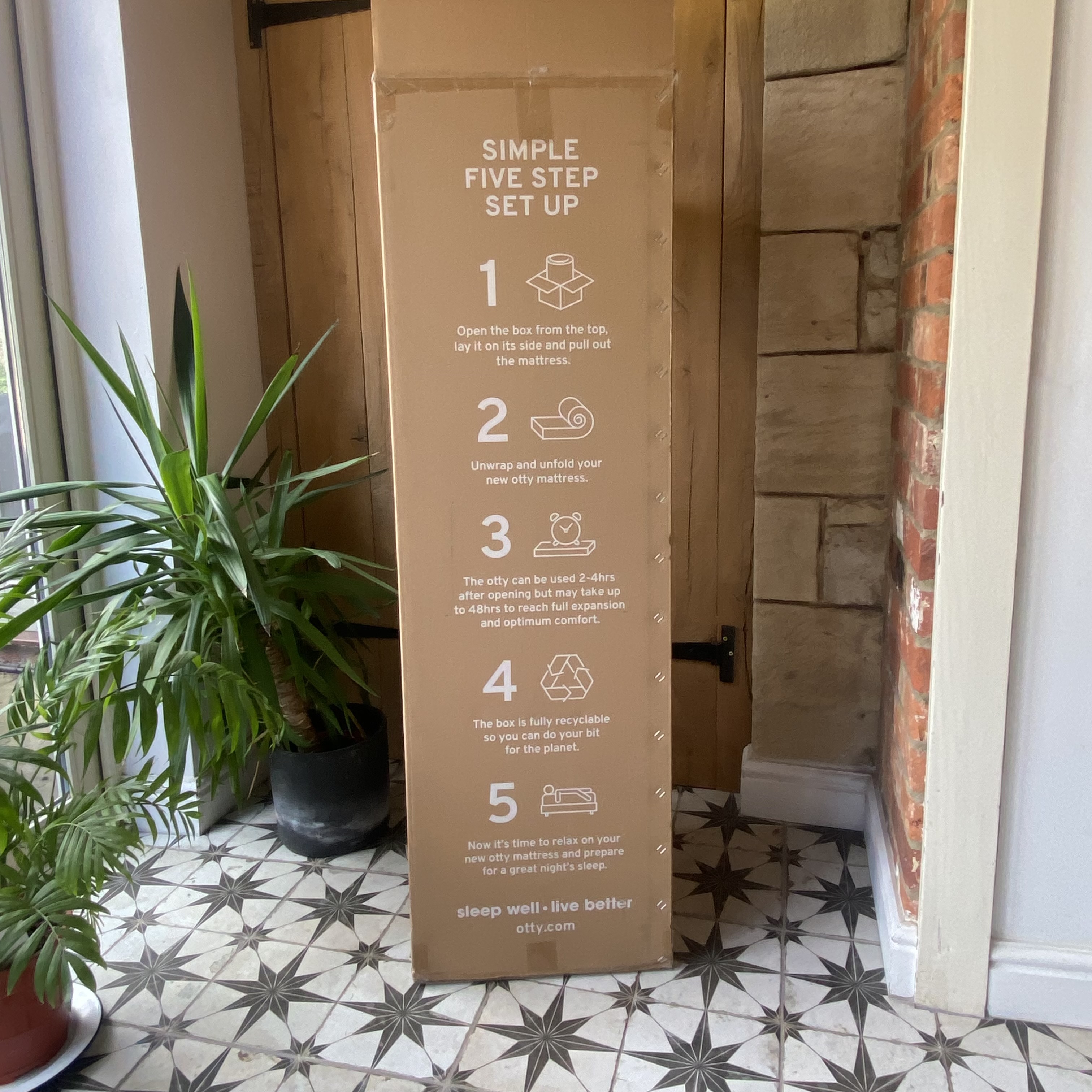 The OTTY Aura Hybrid mattress being tested at home