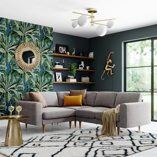 Grey corner sofa in front of bright wallpaper