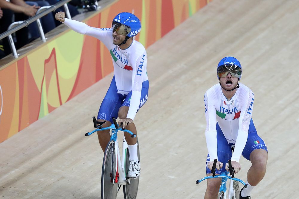 Italian riders celebrate with the crowd