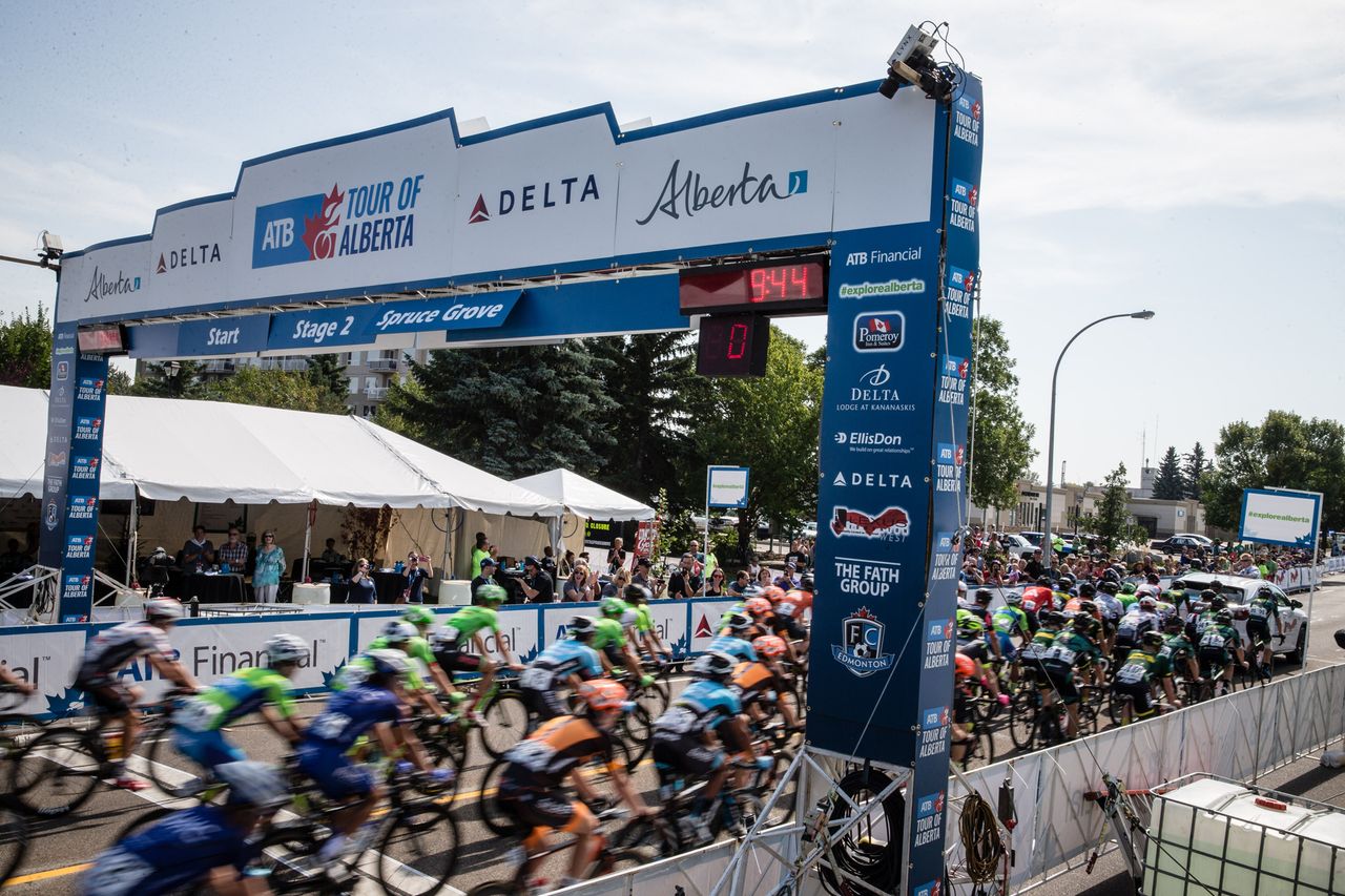 The peloton rolls out of Spruce Grove for the start of stage 2 at the Tour of Alberta