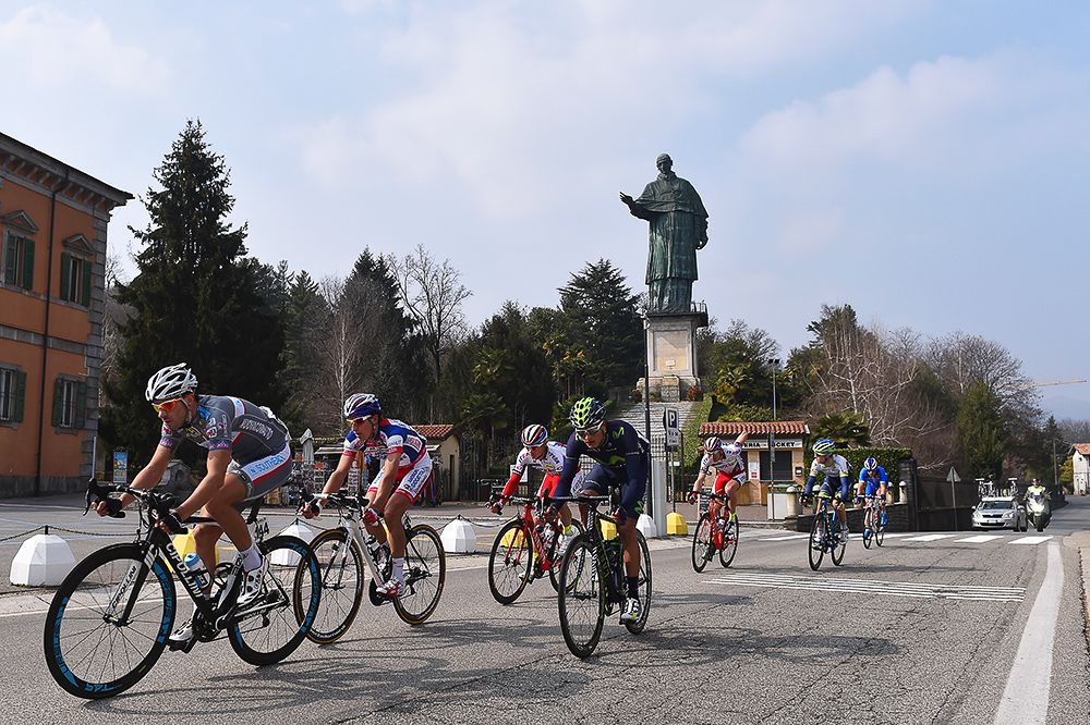 The peloton passes by some local art.