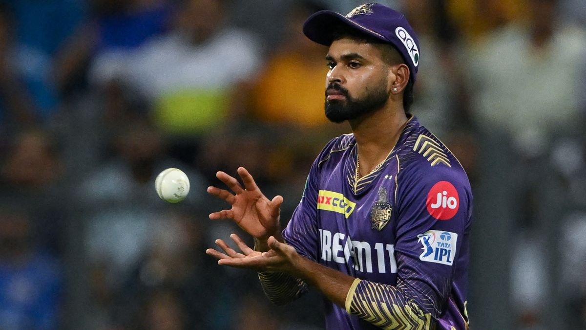 Kolkata Knight Riders&#039; captain Shreyas Iyer collects a throw during the Indian Premier League (IPL) Twenty20 cricket match between Mumbai Indians and Kolkata Knight Riders 