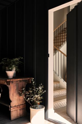 An entrance painted in a black hue