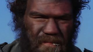 A close up of a dirty Randall "Tex" Cobb in Raising Arizona