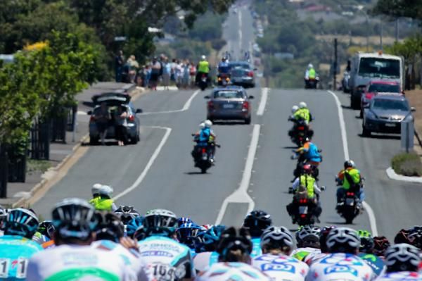 Plenty of motorbikes preceed the riders