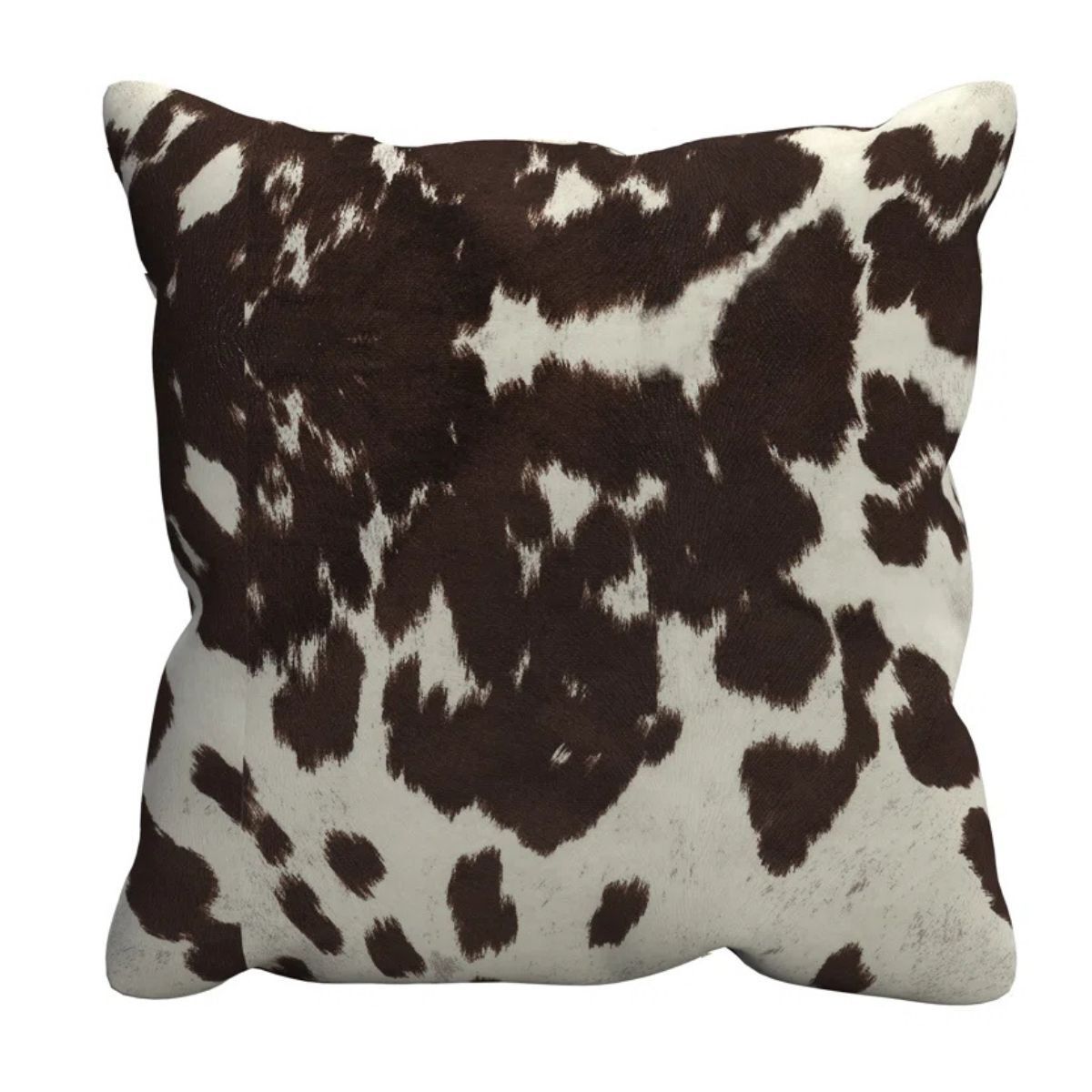 A scatter cushion in a cow hide print