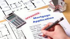 Person completing mortgage application