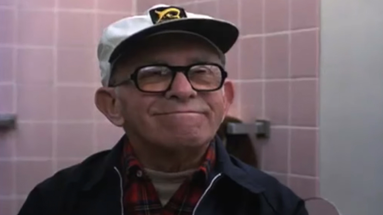 George Burns in sailor hat and glasses, smiling in Oh, God!