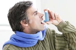 Man using inhaler