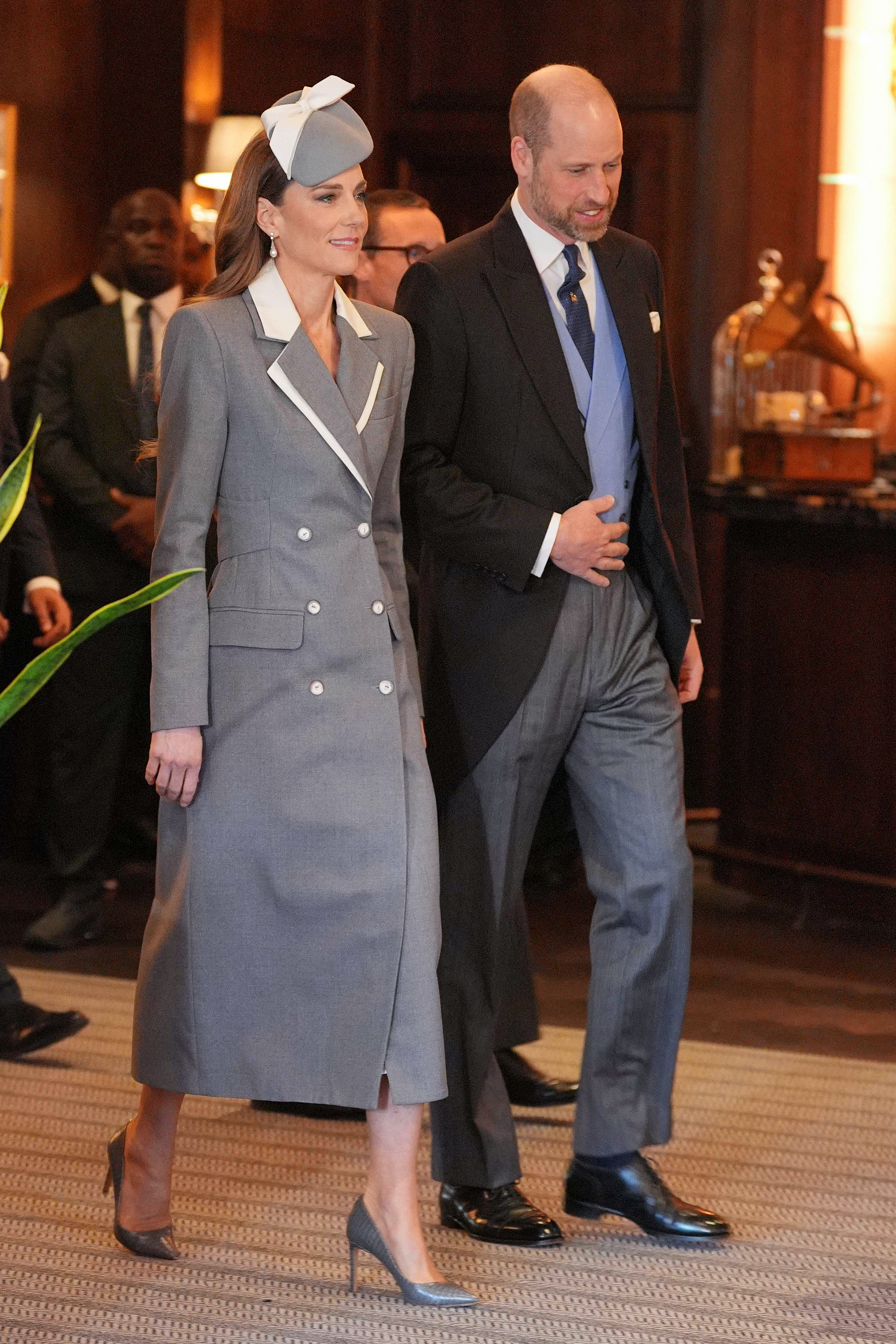 Britain's Prince William, Prince of Wales and Britain's Catherine, Princess of Wales arrive to greet Nigeria's President and his wife at the Fairmont Hotel in Windsor on March 18, 2026, on the first day of a two-day State Visit to the United Kingdom by Nigeria's President. (Photo by Yui Mok / POOL / AFP)