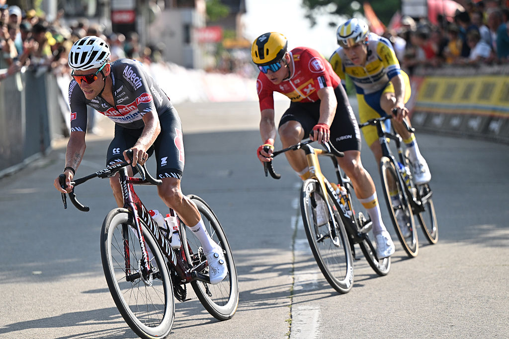 MONT-DE-L'ENCLUS, BELGIUM - AUGUST 15: (L-R) Xandro Meurisse of Belgium and Team Alpecin - Deceuninck, Jonas Abrahamsen of Norway and Team Uno-X Mobilit and Jonas Geens of Belgium and Team Flanders - Baloise compete in the breakaway during the 84th Circuit Franco-Belge 2025 a 206.7km one day race from Tournai to Mont-de-l'Enclus on August 15, 2025 in Mont-de-l'Enclus, Belgium. (Photo by Luc Claessen/Getty Images)
