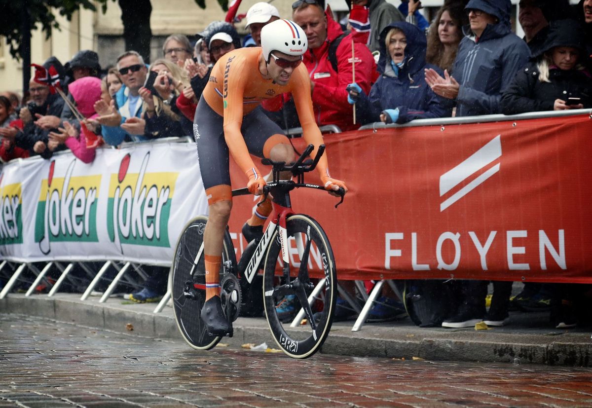 Tom Dumoulin endured soggy conditions en route to his title