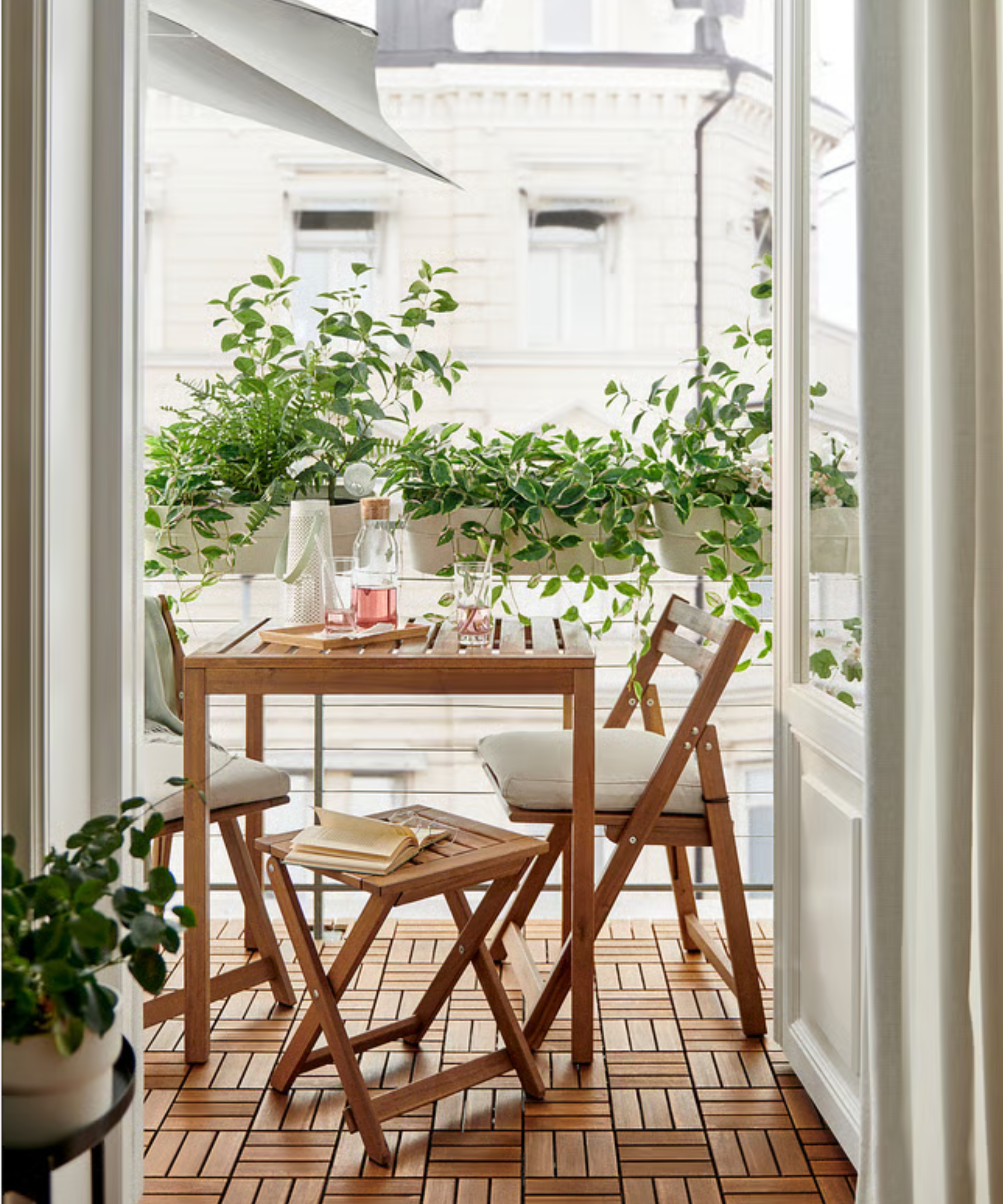 a bistro table on a small porch