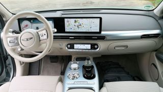 Full-width dash view from the rear seats of the GV60