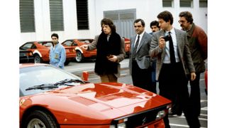 30._visit_to_ferrari_-_mick_jagger_leader_of_the_rolling_stones_on_the_delivery_of_his_gto.jpg