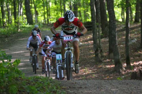 Eric Oftedahl (Maplelag/Paramount) leading a chase group through the woods