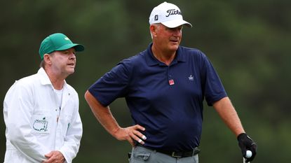 Sandy Lyle and his caddie on the putting green at the 2023 Masters