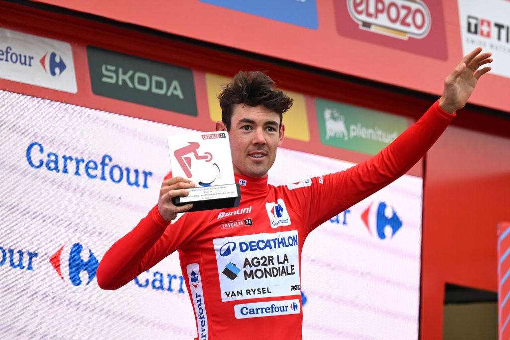 MAESTU PARQUE NATURAL DE IZKI SPAIN SEPTEMBER 05 Ben OConnor of Australia and Team Decathlon AG2R La Mondiale Red Leader Jersey celebrates at podium during the La Vuelta 79th Tour of Spain 2024 Stage 18 a 1798km stage from VitoriaGasteiz to Maestu Parque Natural de Izki UCIWT on September 05 2024 in Maestu Parque Natural de Izki Spain Photo by Tim de WaeleGetty Images