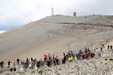 MALAUCENE FRANCE JULY 07 The peloton passing through Mont Ventoux 1910m mountain landscape during the 108th Tour de France 2021 Stage 11 a 1989km km stage from Sorgues to Malaucne Fog Public Fans LeTour TDF2021 on July 07 2021 in Malaucene France Photo by Michael SteeleGetty Images