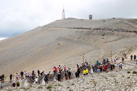 MALAUCENE FRANCE JULY 07 The peloton passing through Mont Ventoux 1910m mountain landscape during the 108th Tour de France 2021 Stage 11 a 1989km km stage from Sorgues to Malaucne Fog Public Fans LeTour TDF2021 on July 07 2021 in Malaucene France Photo by Michael SteeleGetty Images