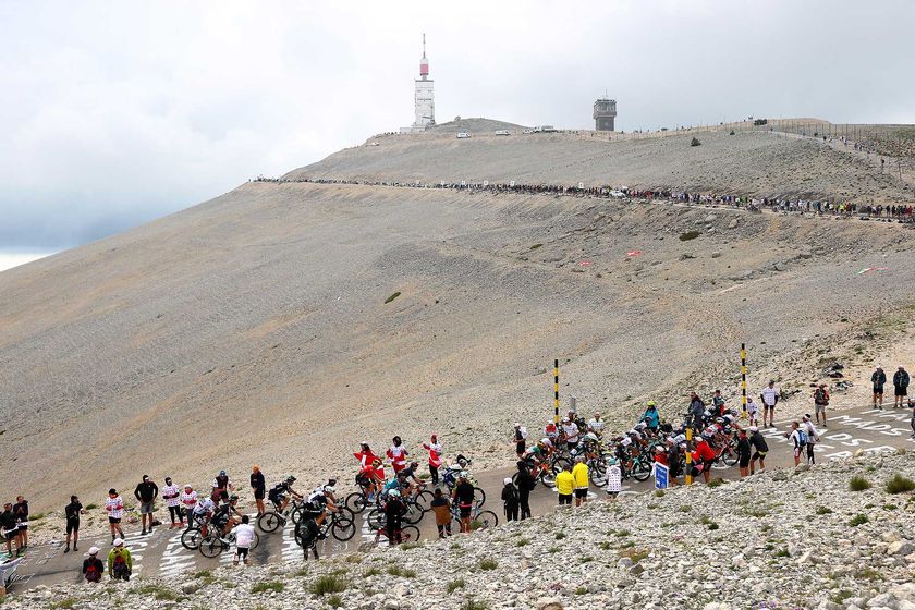 MALAUCENE FRANCE JULY 07 The peloton passing through Mont Ventoux 1910m mountain landscape during the 108th Tour de France 2021 Stage 11 a 1989km km stage from Sorgues to Malaucne Fog Public Fans LeTour TDF2021 on July 07 2021 in Malaucene France Photo by Michael SteeleGetty Images