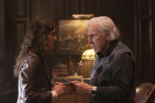Jess Valenzuela (Lisette Olivera) and Peter Sadusky (Harvey Keitel) stand facing each other in mid-conversation in National Treasure: Edge of History.