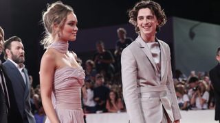 VENICE, ITALY - SEPTEMBER 02: Lily-Rose Depp and Timothee Chalamet attend "The King" red carpet during the 76th Venice Film Festival at Sala Grande on September 02, 2019 in Venice, Italy.