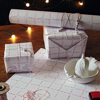 gifts with paper wrap and string lights