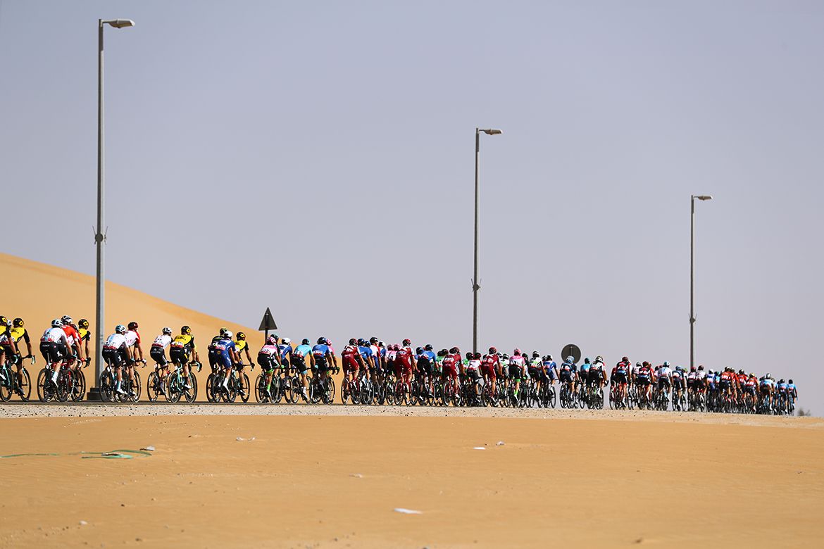 The peloton riding through the Abu Dhabi desert