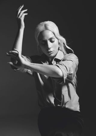 Lady Gaga dancing, eyes closed
